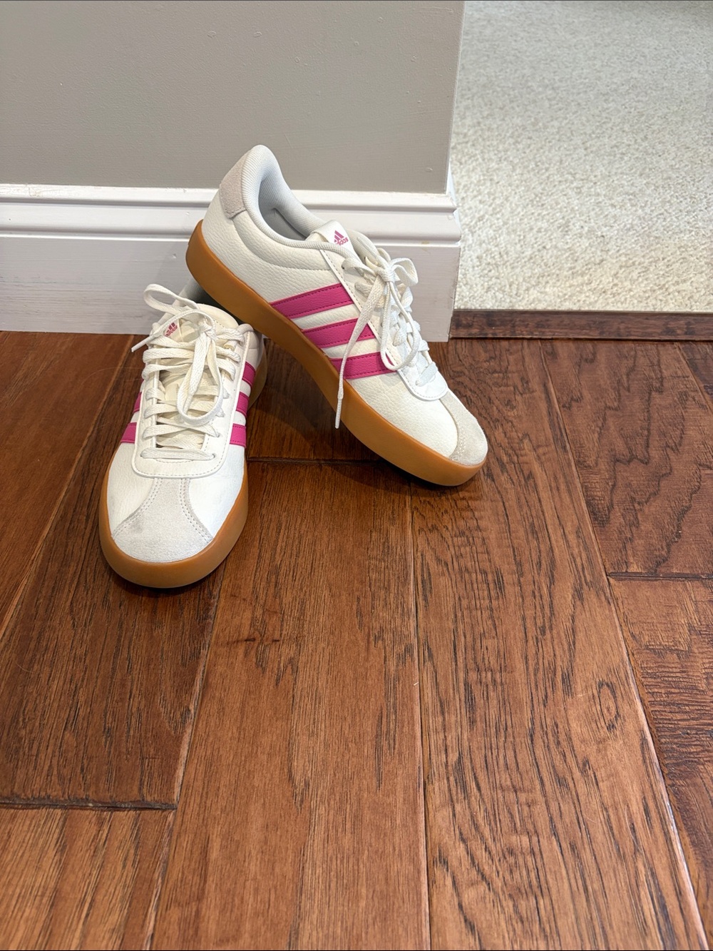 adidas Women’s White Sneakers with Pink Stripes and Gum Sole
